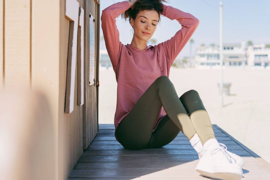 girl wears green summer leggings