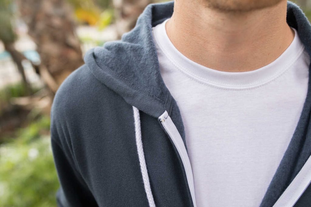 man wears white round neck t-shirt 